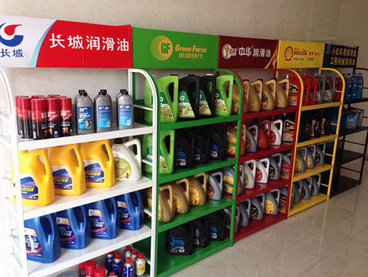 कस्टम ठंडे बस्ते में डालने वाला सुपरमार्केट कार सहायक उपकरण प्रदर्शन रैक हरा पीला सफेद